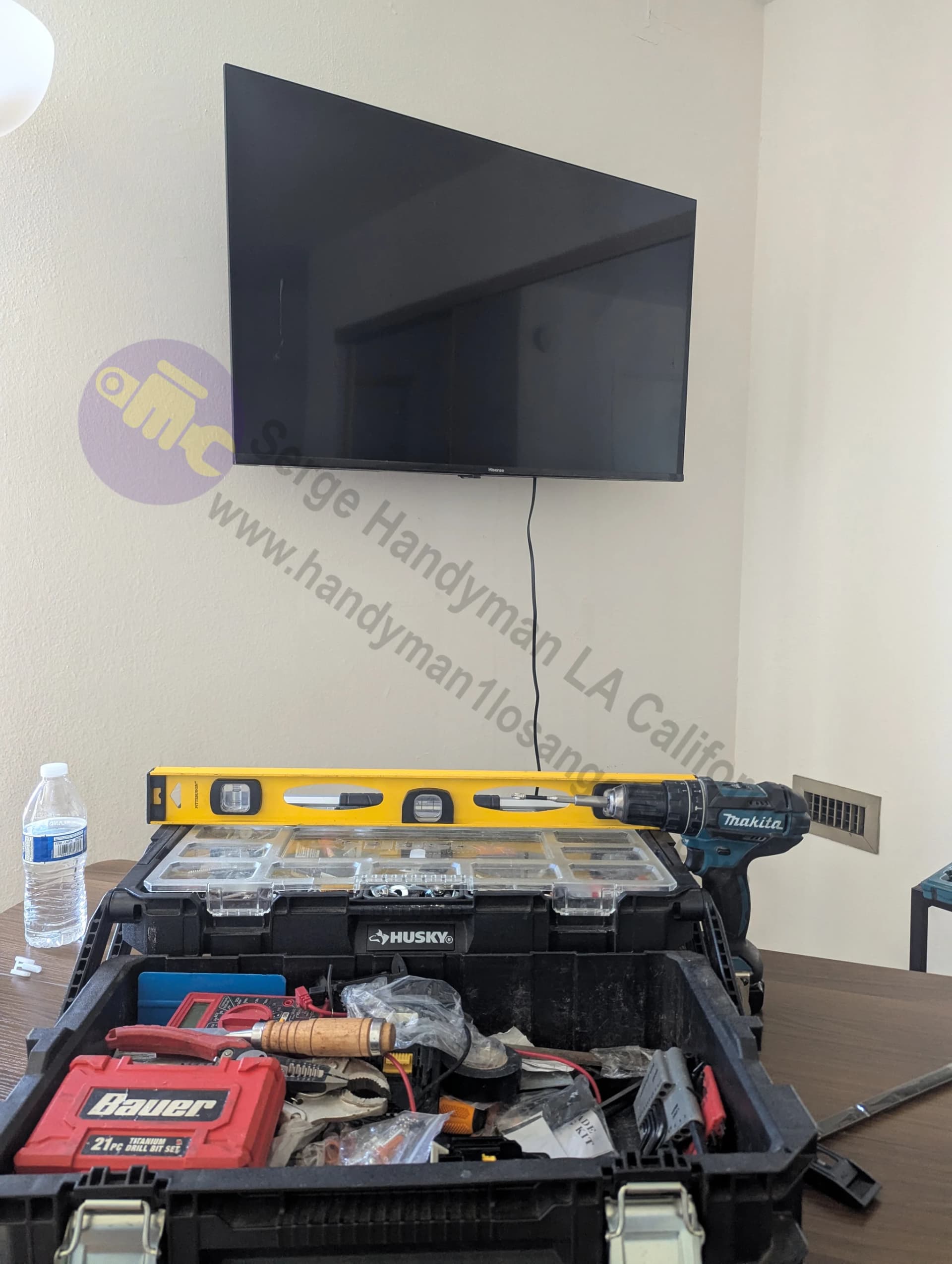 Large flat screen TV wall mounting installation in Burbank CA