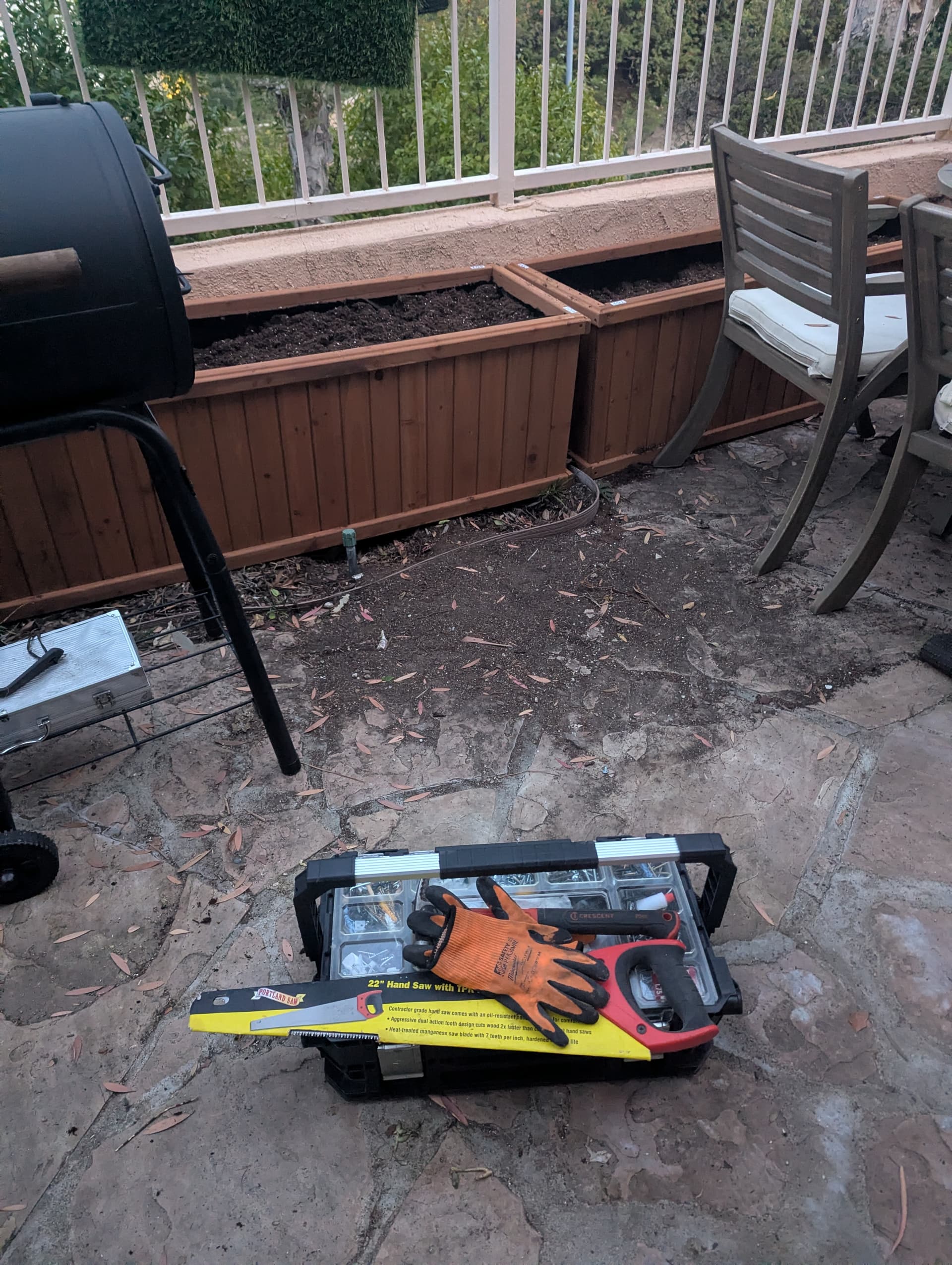 Custom wooden garden planter installation by handyman