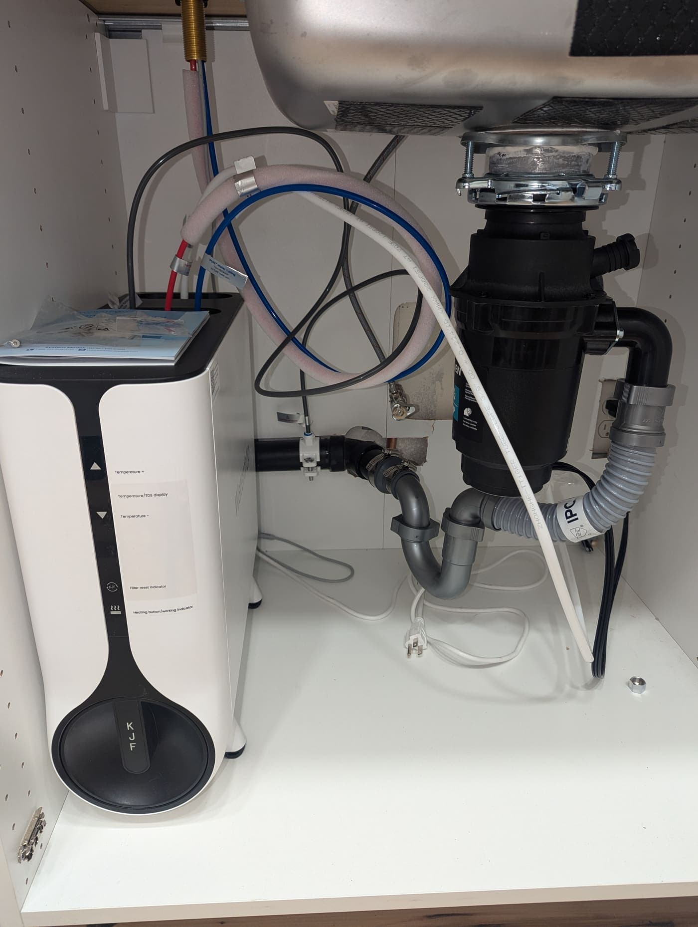 Under-sink water filter installation below a kithen sink in Los Angeles
