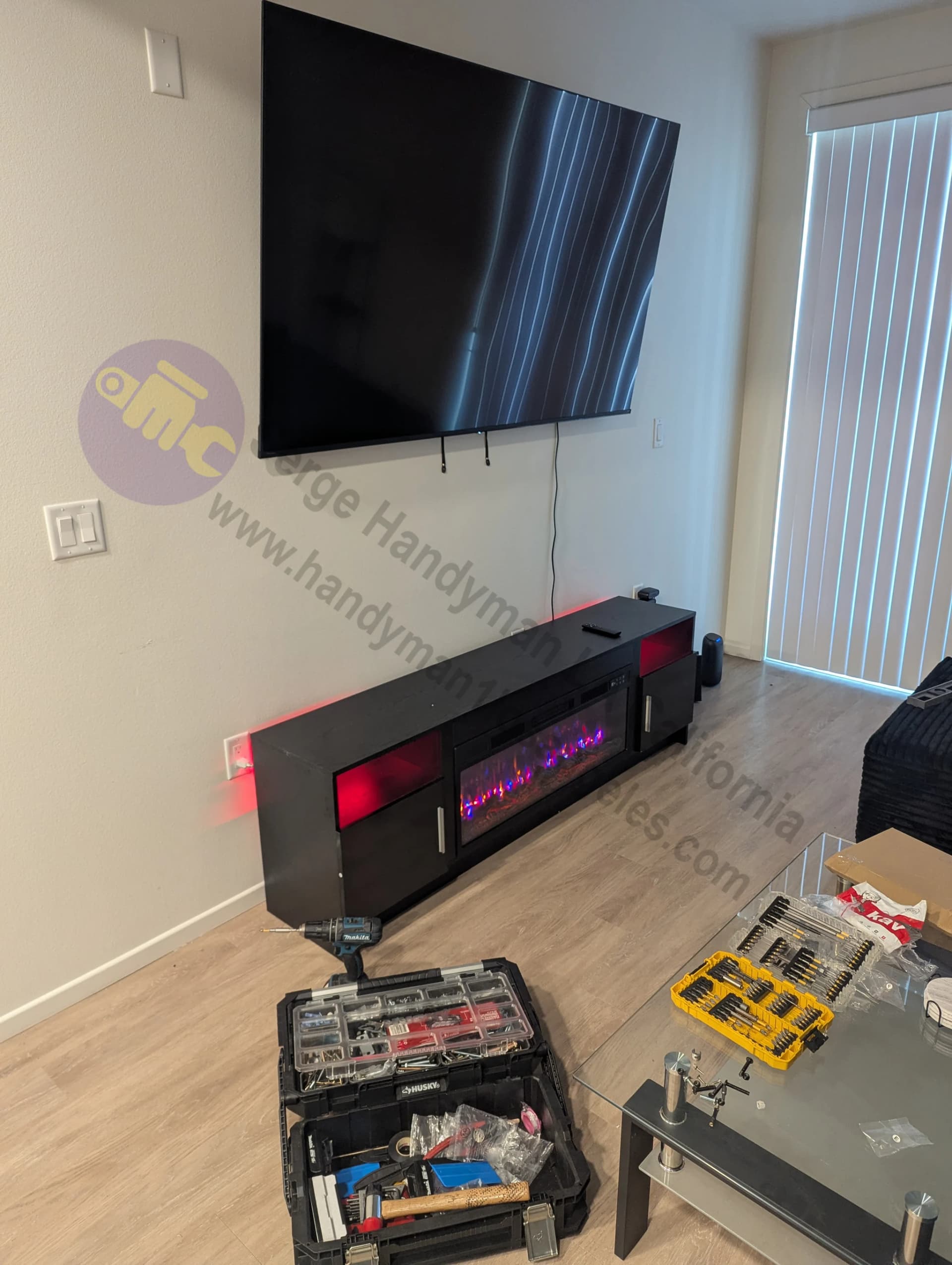 Large 65" flat screen TV wall mounting installation in Pasadena CA
